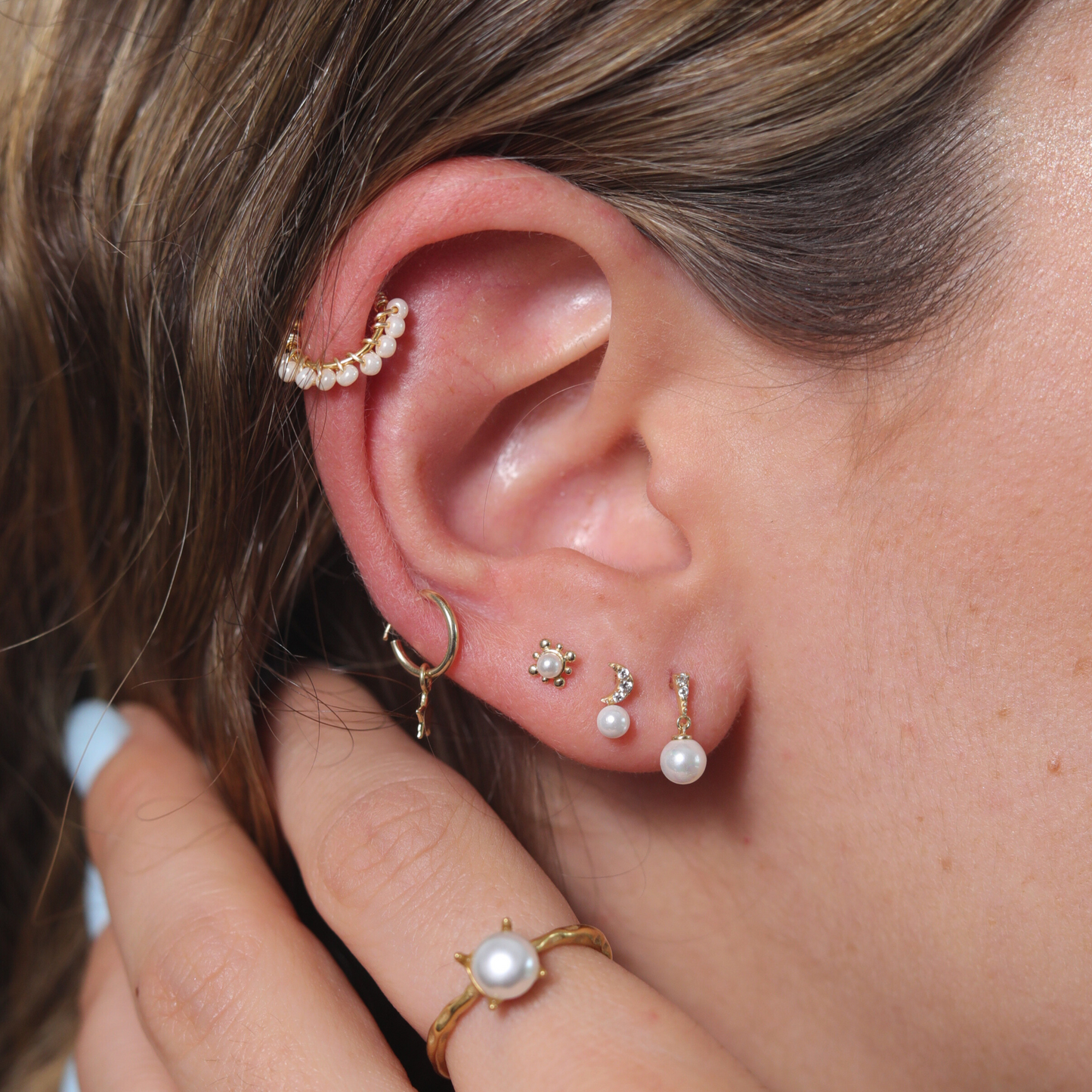 BROQUEL ORO 10K NIDIA