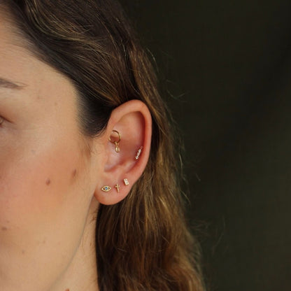 BROQUEL ORO 10K OJO FARA